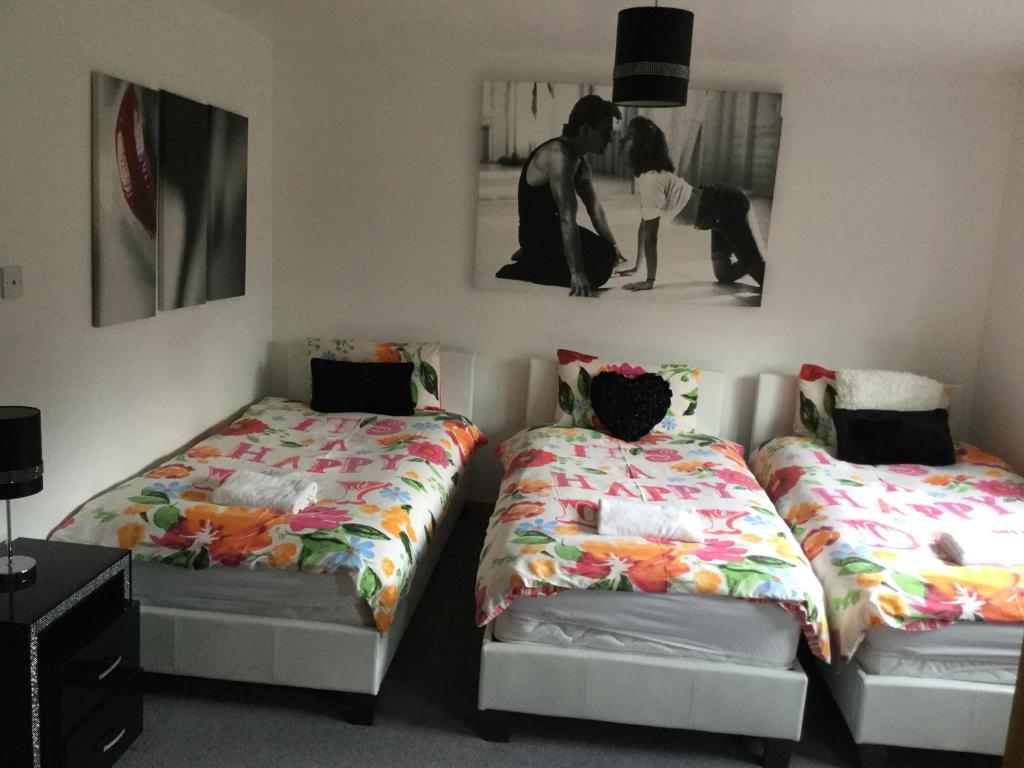 Postel nebo postele na pokoji v ubytování La Fortuna Lodges