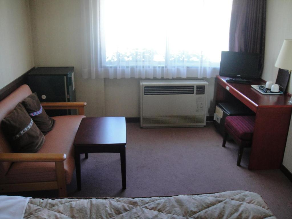 Posezení v ubytování Hotel Weisser Hof Happei