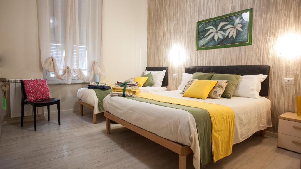 Postel nebo postele na pokoji v ubytování Il Quadrifoglio guesthouse