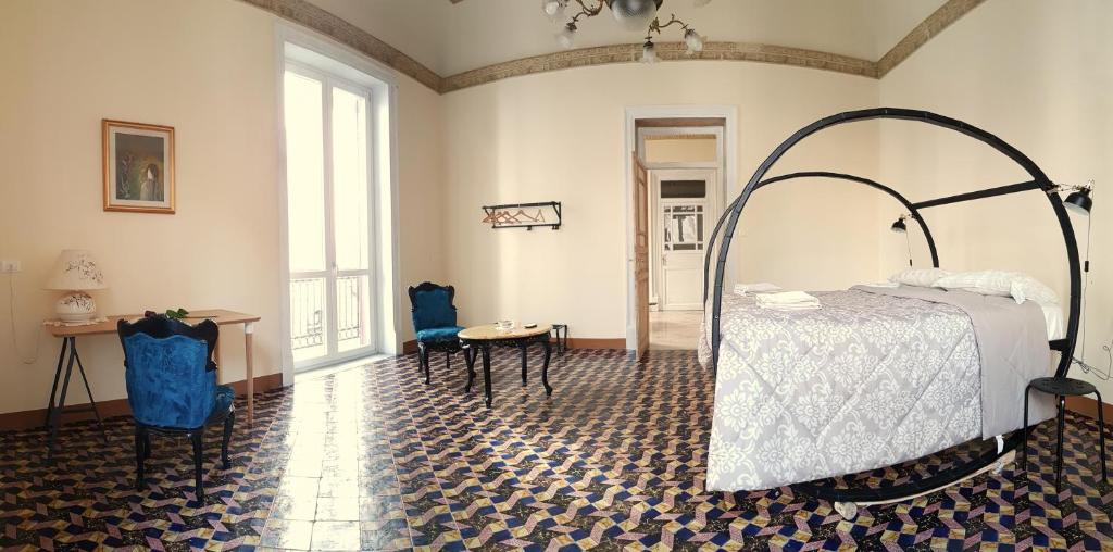 Postel nebo postele na pokoji v ubytování Artisan Maison Palermo