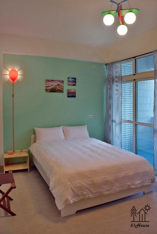 Postel nebo postele na pokoji v ubytování No.51 Ruisui Homestay