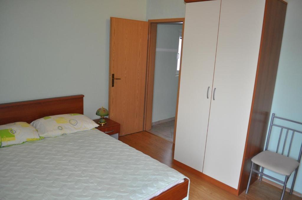 Postel nebo postele na pokoji v ubytování Apartments Zora