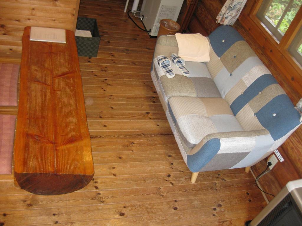 Posezení v ubytování Log Cottage Himawari
