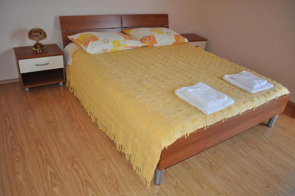 Postel nebo postele na pokoji v ubytování Apartments Zora