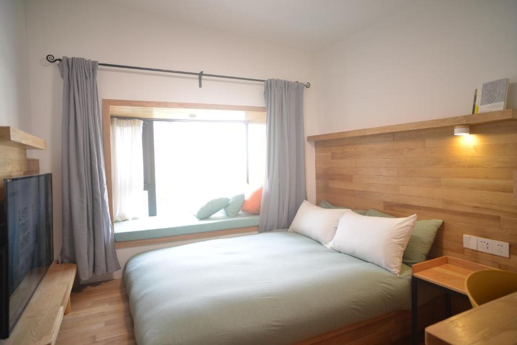 Postel nebo postele na pokoji v ubytování Rock&Wood Cozy House