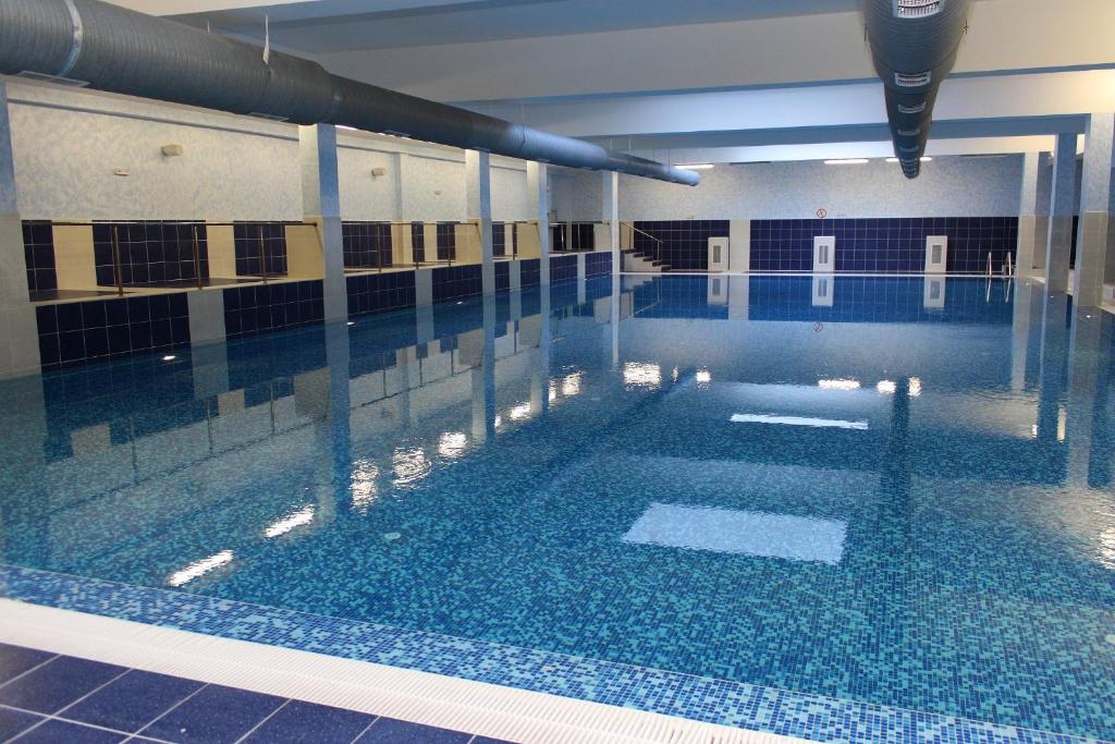 Bazén v ubytování Hotel Arena nebo v jeho okolí