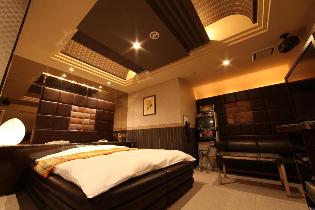 Postel nebo postele na pokoji v ubytování Hotel La Siena (Adult Only)