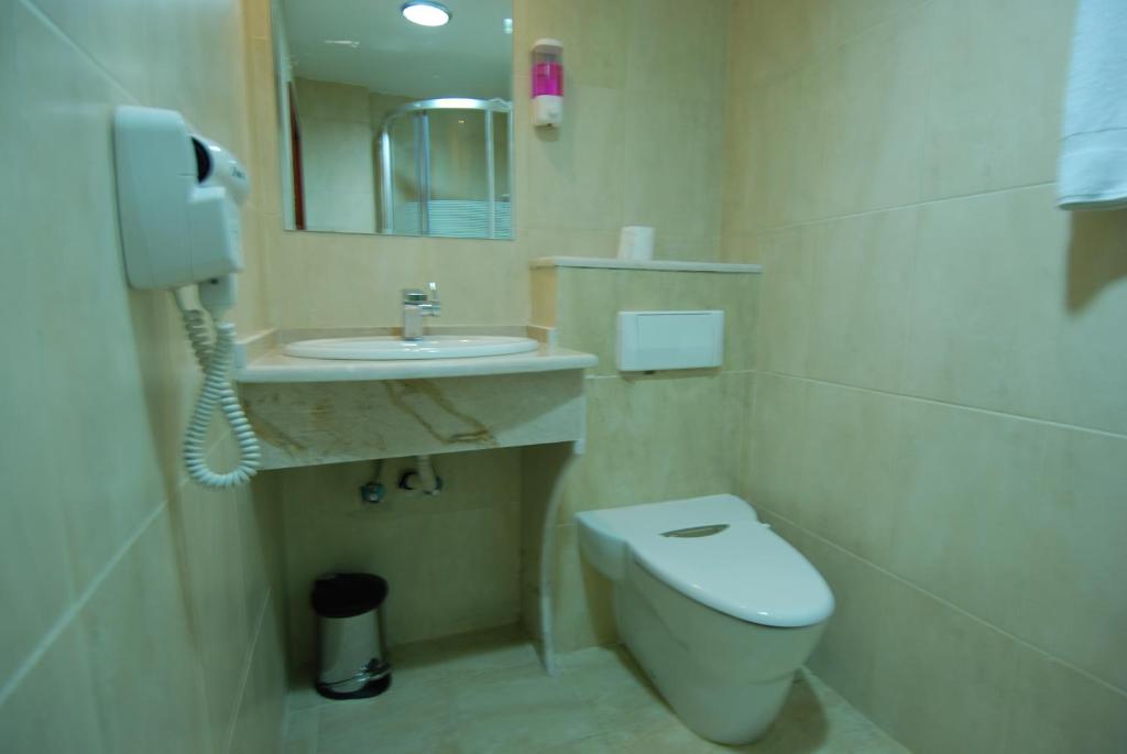 Koupelna v ubytování Al Rashid Hotel