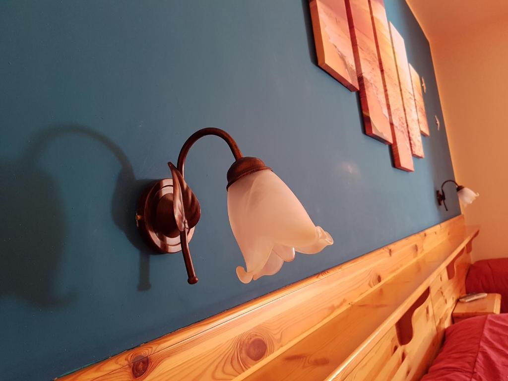 Postel nebo postele na pokoji v ubytování Hotel Il Cortile