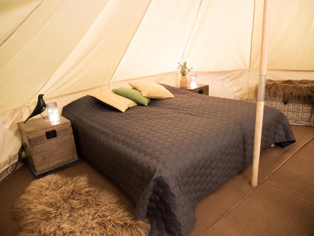 Postel nebo postele na pokoji v ubytování Camp Boutique