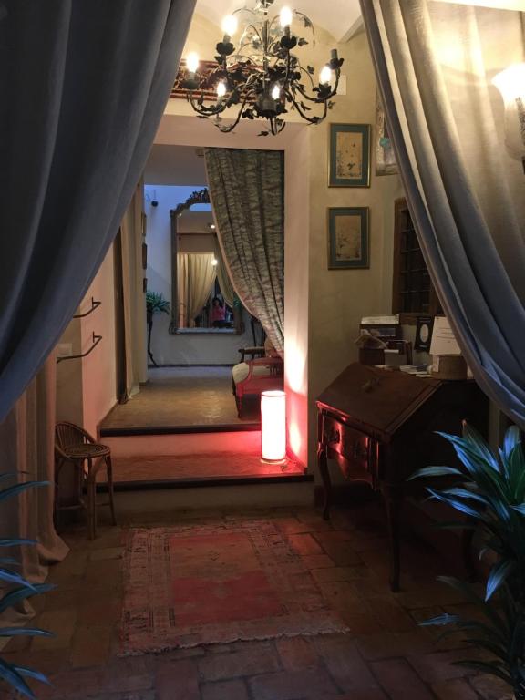 Posteľ alebo postele v izbe v ubytovaní Hostal Casa Del Buen Viaje