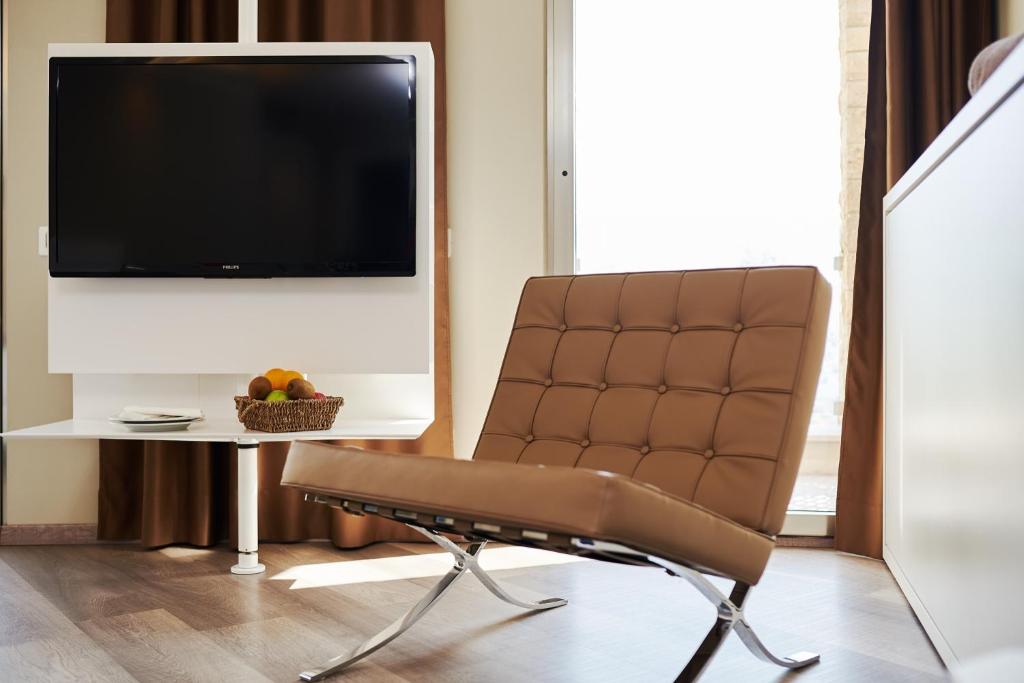 TV a/nebo společenská místnost v ubytování Agriturismo Maso Botes