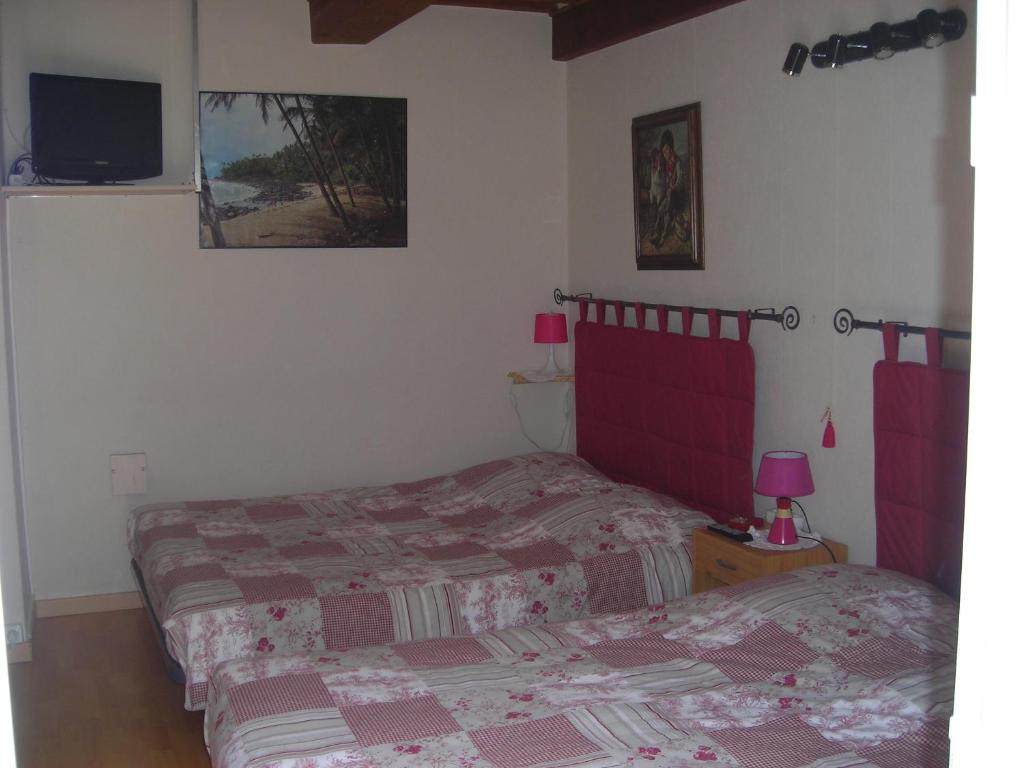 Postel nebo postele na pokoji v ubytování La villa Sam
