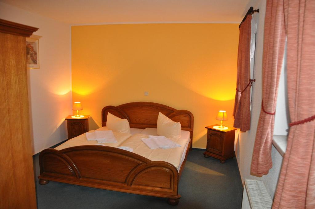 Postel nebo postele na pokoji v ubytování Hotel-Restaurant Elsterblick