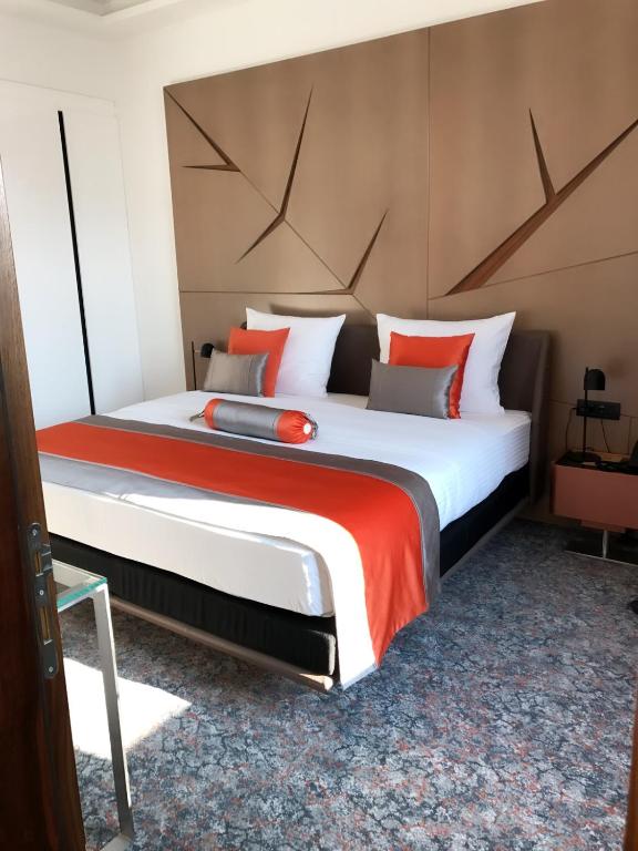 Postel nebo postele na pokoji v ubytování Hotel Austria & Bosna
