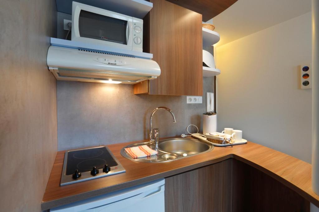 Kuchyň nebo kuchyňský kout v ubytování Suite Home Apt Luberon