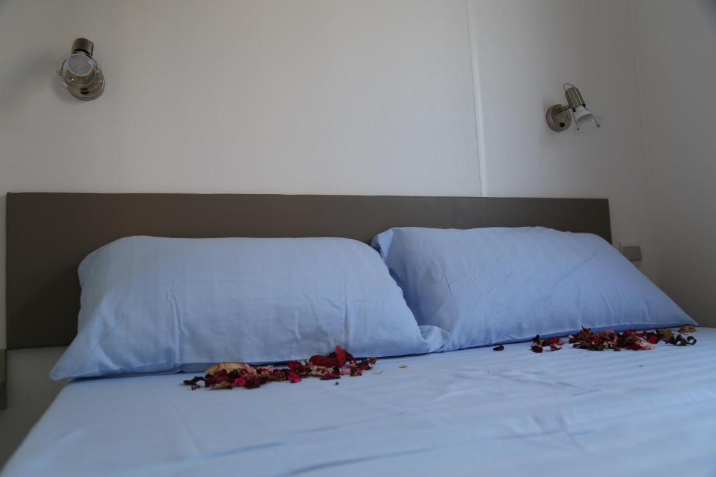 Postelja oz. postelje v sobi nastanitve Camping Cisano - San Vito