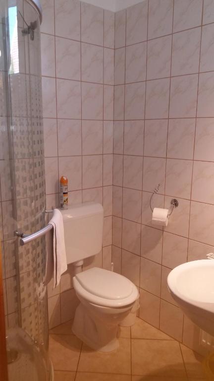 Koupelna v ubytování Muskátli Apartman