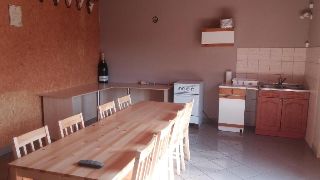 Kuchyň nebo kuchyňský kout v ubytování Muskátli Apartman