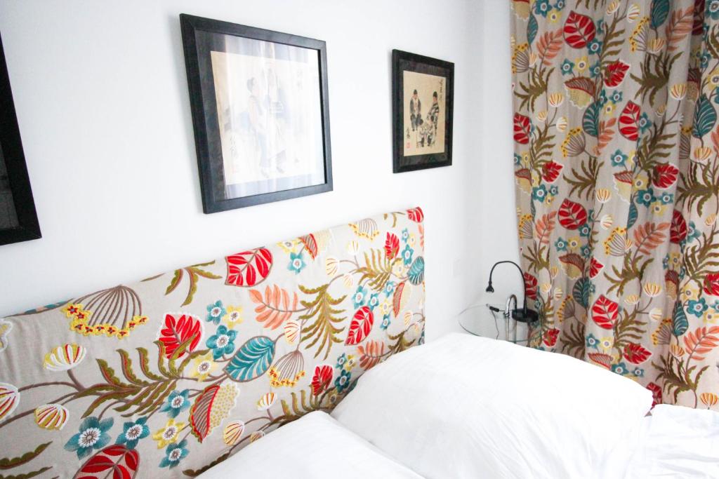 Postel nebo postele na pokoji v ubytování das kleine Hotel in München