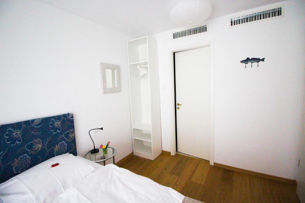 Postel nebo postele na pokoji v ubytování das kleine Hotel in München