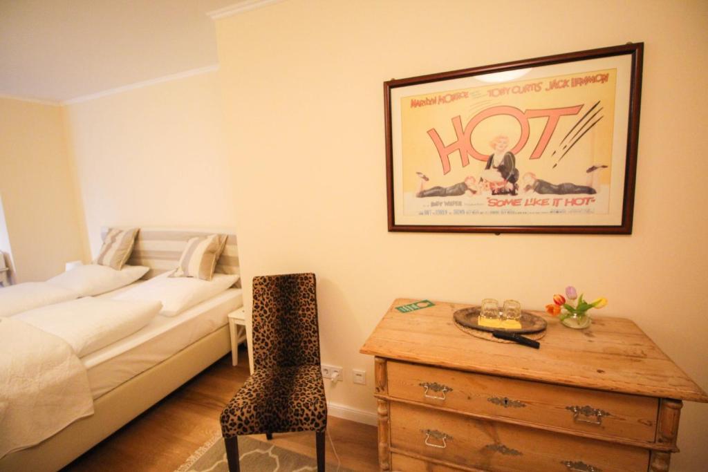 Postel nebo postele na pokoji v ubytování das kleine Hotel in München