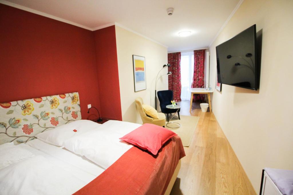 TV a/nebo společenská místnost v ubytování das kleine Hotel in München