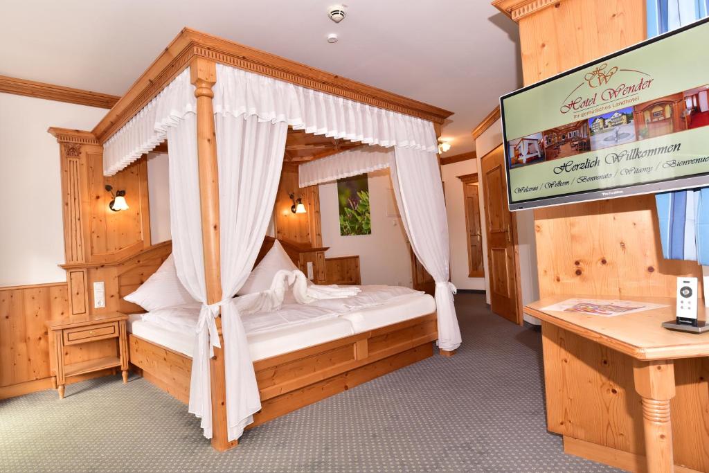 Postel nebo postele na pokoji v ubytování Hotel Wender