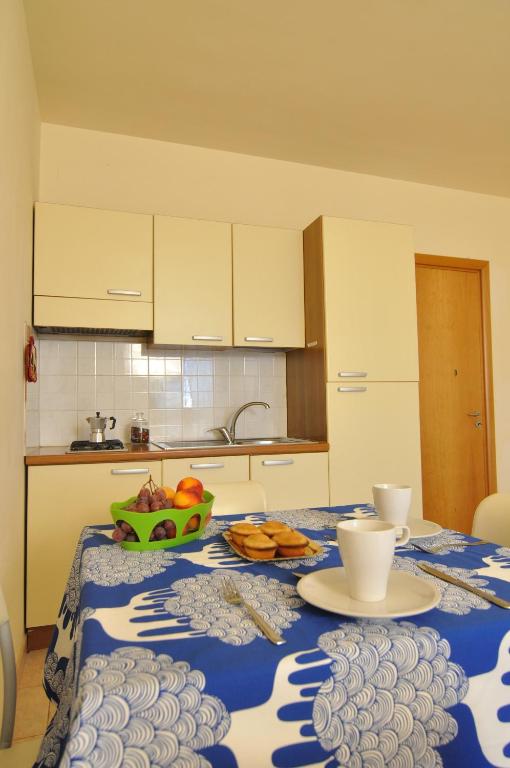 Kuchyň nebo kuchyňský kout v ubytování Residence Oasi Salento