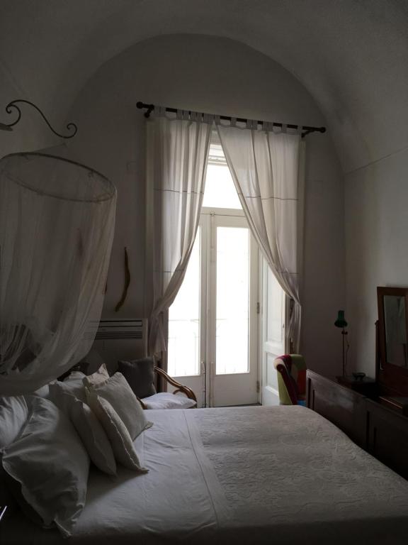 A bed or beds in a room at Casa Letizia Amalfi Coast
