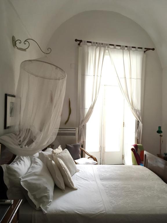 A bed or beds in a room at Casa Letizia Amalfi Coast