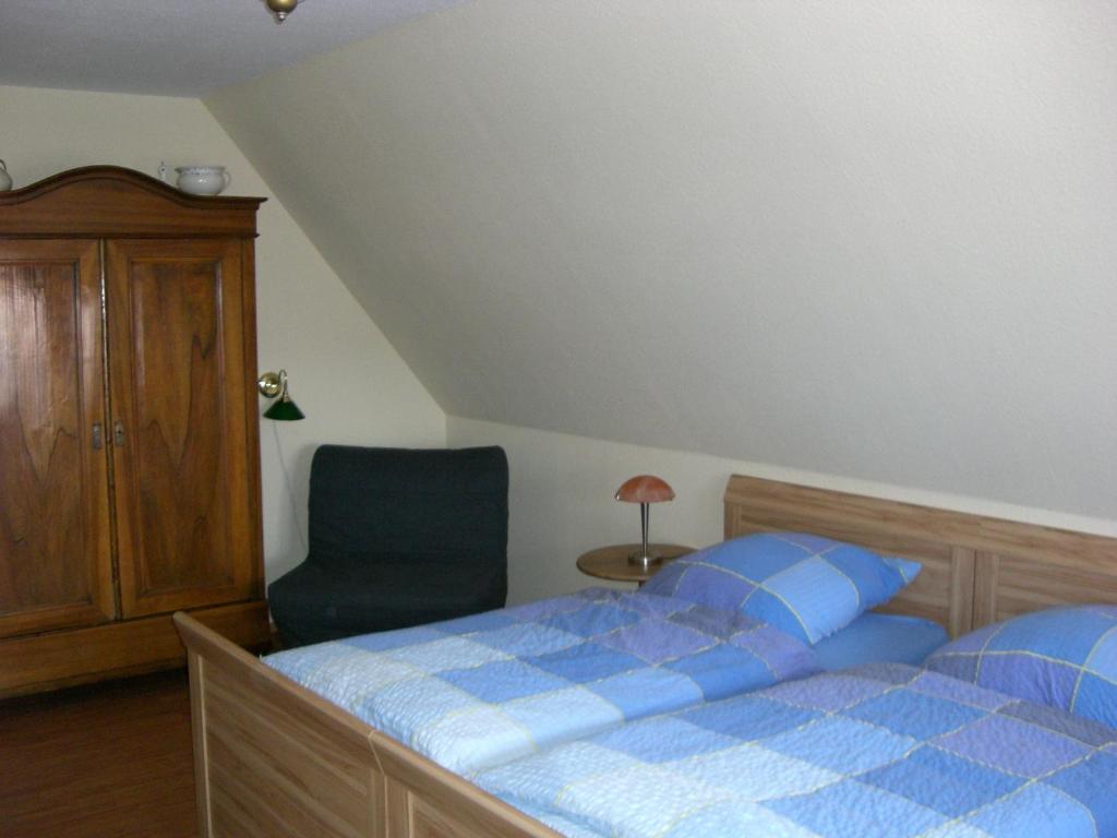 Postel nebo postele na pokoji v ubytování The Cosy Home