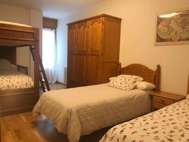 Postel nebo postele na pokoji v ubytování Biescas Centro! Garaje y wifi!!
