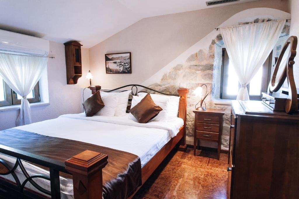 Postel nebo postele na pokoji v ubytování Hotel Galathea