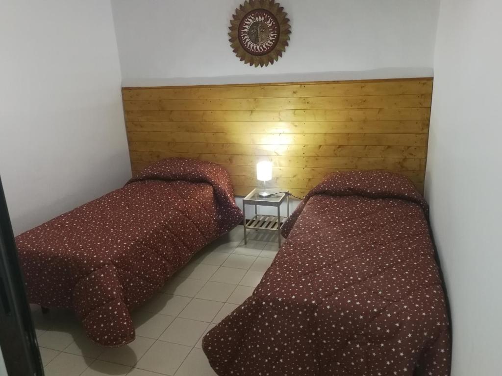 A bed or beds in a room at La casa di Joseph