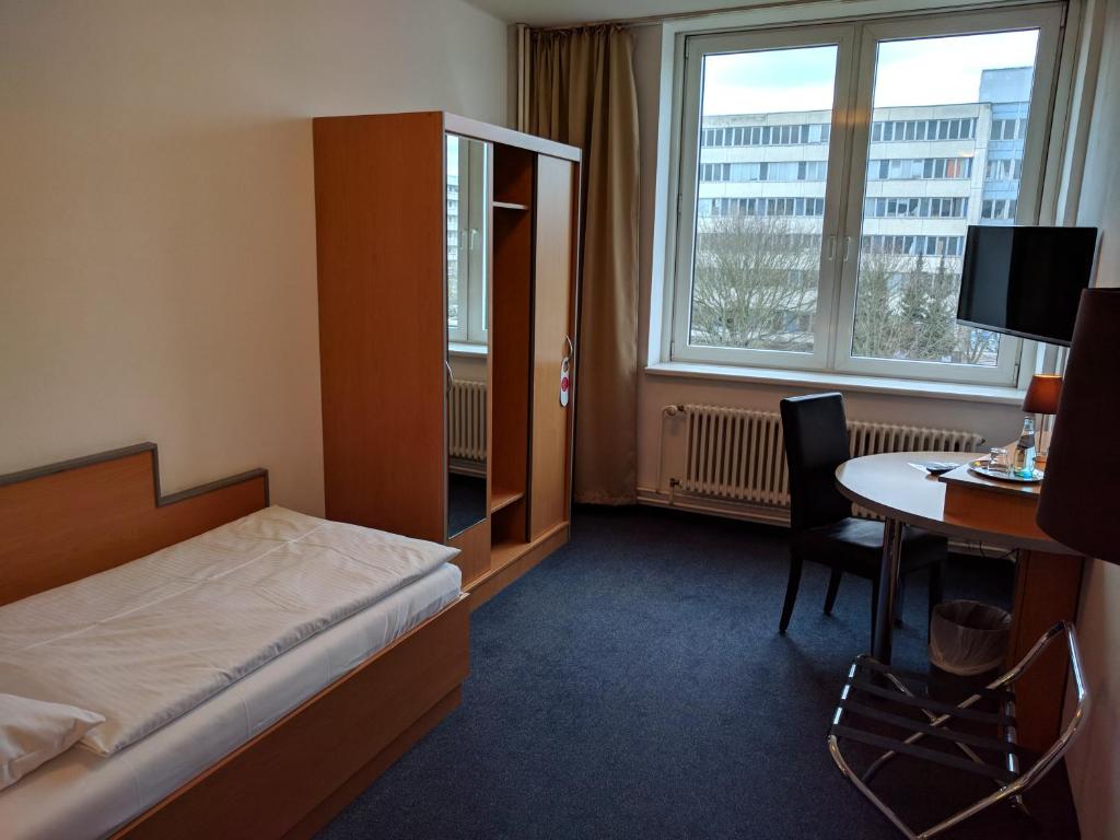Postel nebo postele na pokoji v ubytování Hotel Sedes