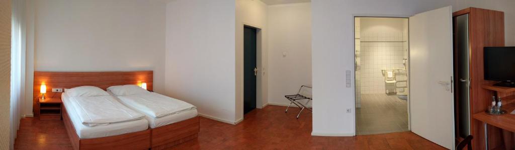 Postel nebo postele na pokoji v ubytování Hotel Sedes