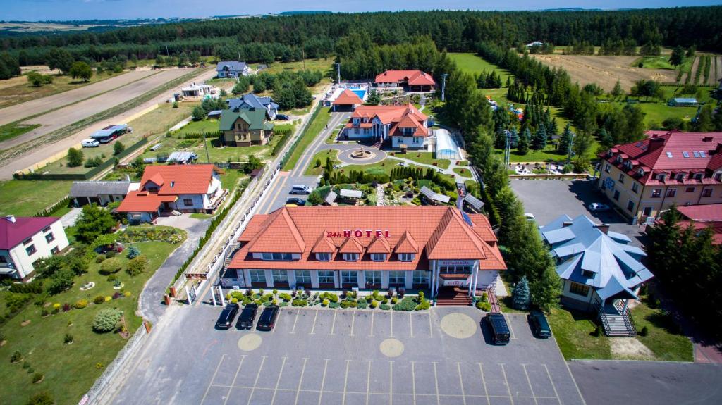 an overhead view of a large building with a roof at Hotel & Spa Arkadia in Tomasz&oacute;w Lubelski