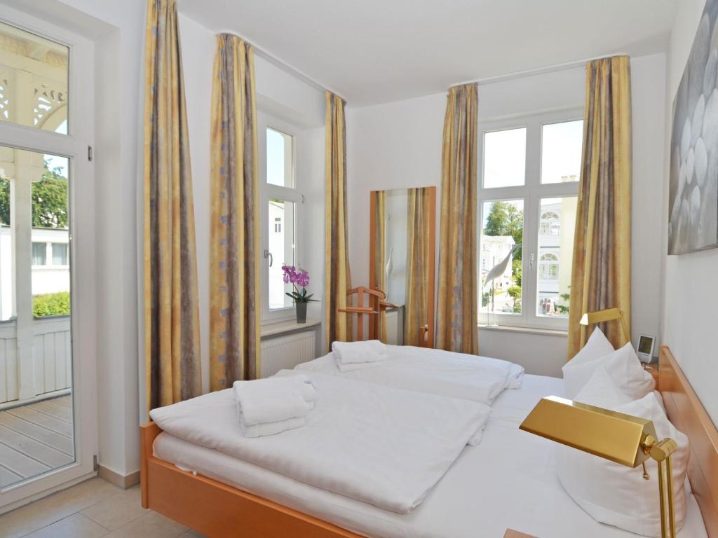 Postel nebo postele na pokoji v ubytování Haus Möwe - Apt. 03