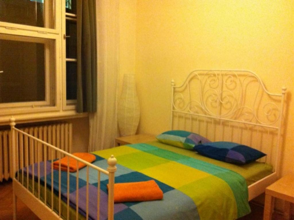 Postel nebo postele na pokoji v ubytování Ragtime
