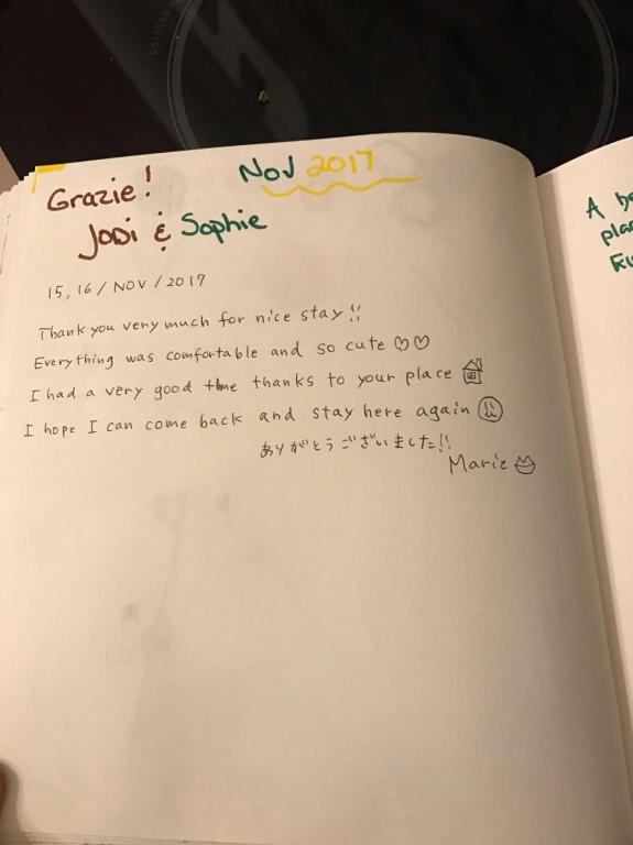 a page of a book with a handwritten note at Rifugio dei Pescatori in Riomaggiore