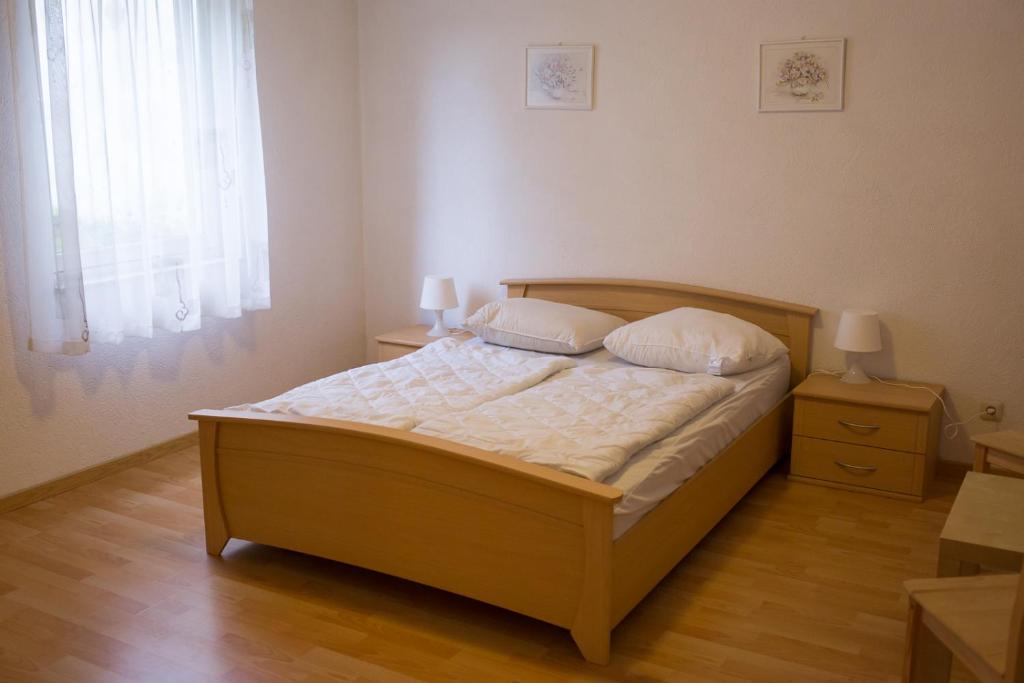 Postel nebo postele na pokoji v ubytování Haus Nova am Bollerberg