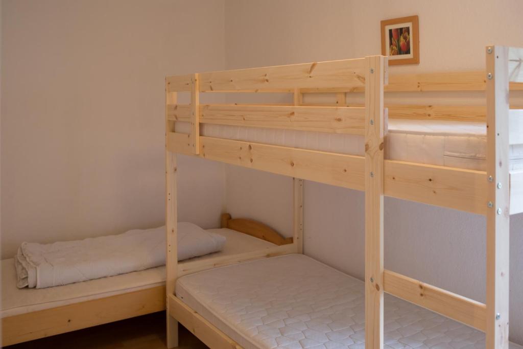 Postel nebo postele na pokoji v ubytování Haus Nova am Bollerberg