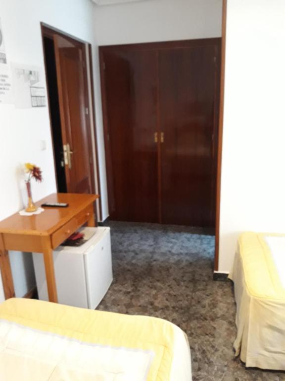 Postel nebo postele na pokoji v ubytování San Cristobal