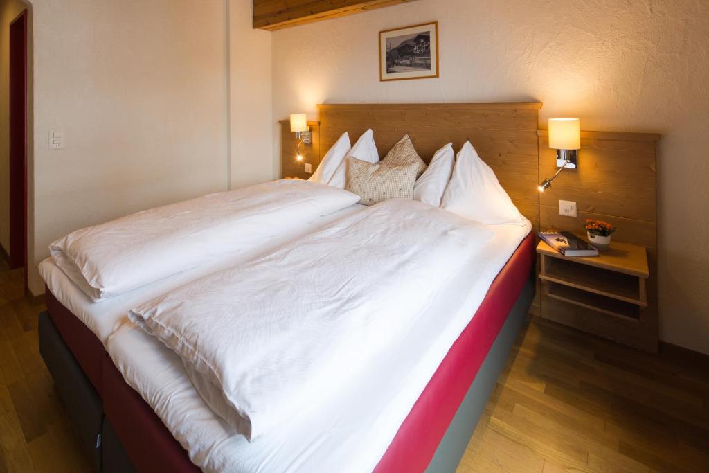 Postel nebo postele na pokoji v ubytování Hotel Edelweiss Superior