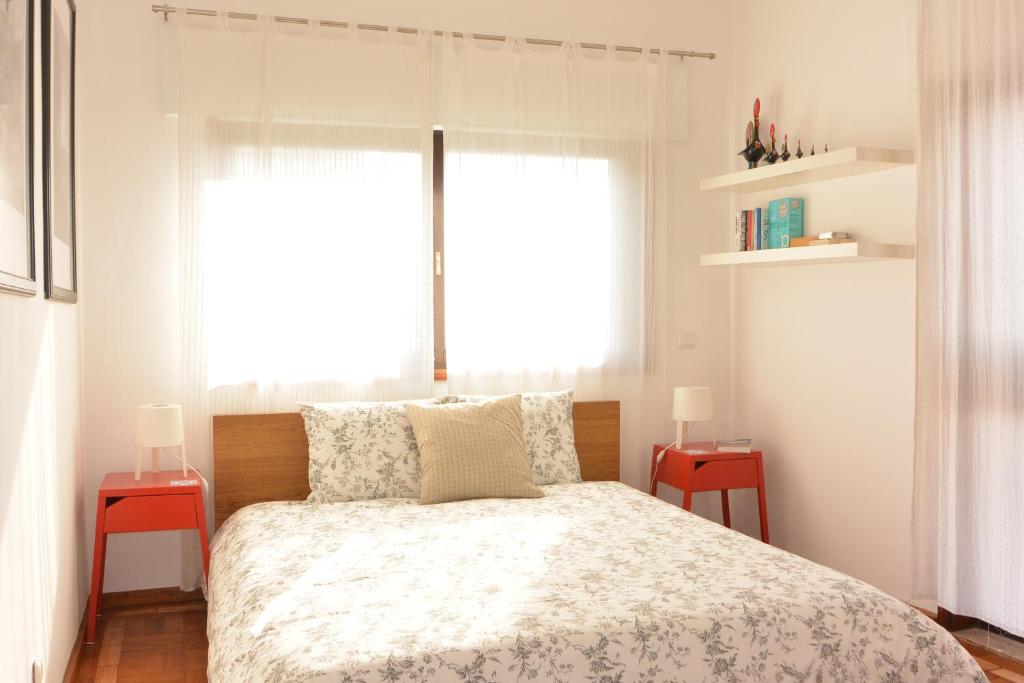 Giường trong phòng chung tại Sunny Porto by Flat in Porto