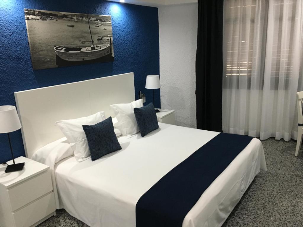 Postel nebo postele na pokoji v ubytování Hotel Gri-Mar
