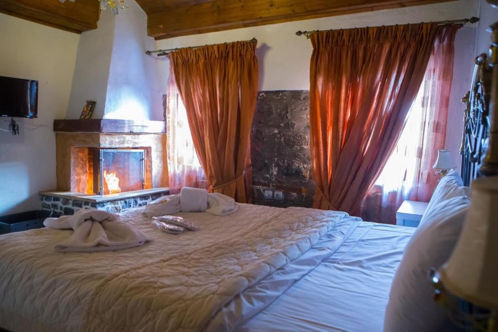 Posteľ alebo postele v izbe v ubytovaní Guesthouse Tsegani