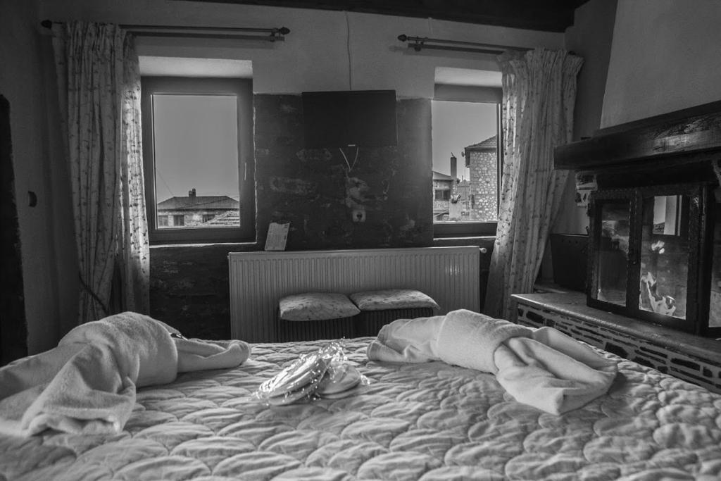 Posteľ alebo postele v izbe v ubytovaní Guesthouse Tsegani