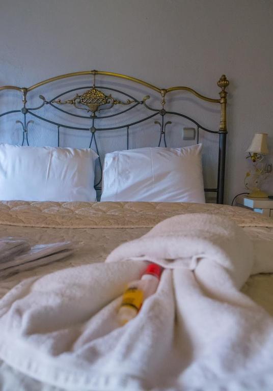 Posteľ alebo postele v izbe v ubytovaní Guesthouse Tsegani